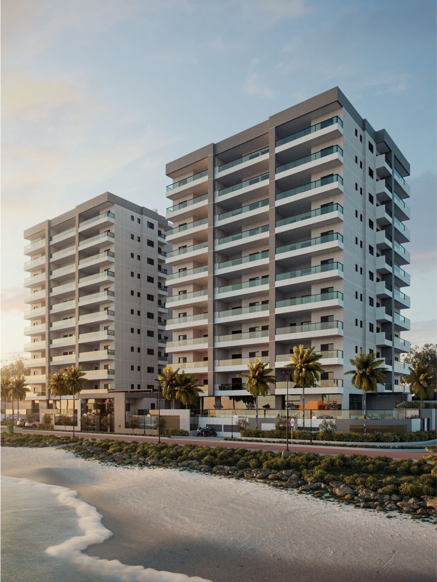 As duas torres do Residencial Ana Frizon vistas da faixa de areia, com o mar em primeiro plano
